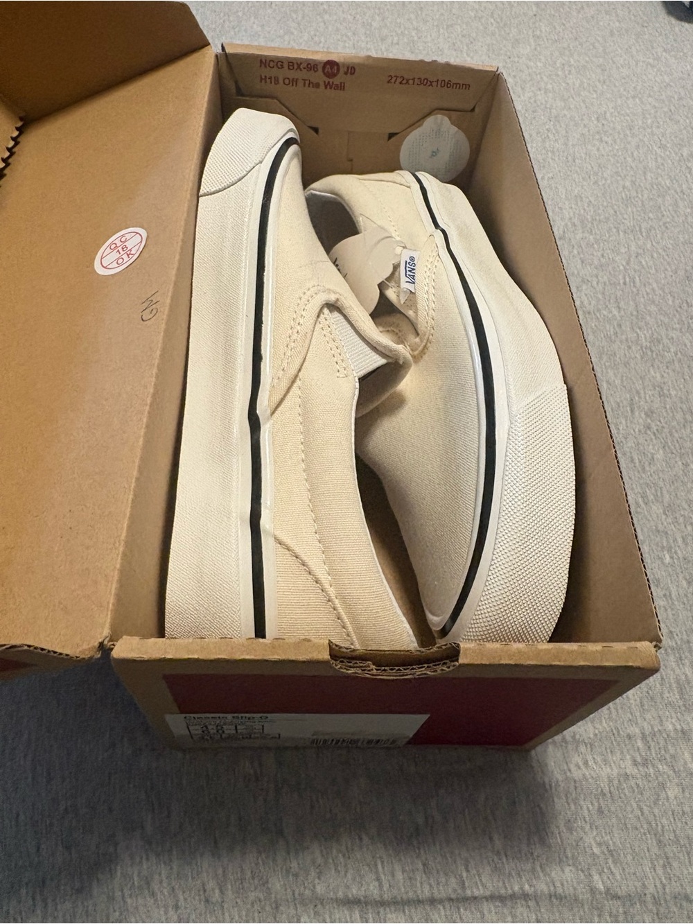 Vans slip-On Canvas Sneakers in Off-White